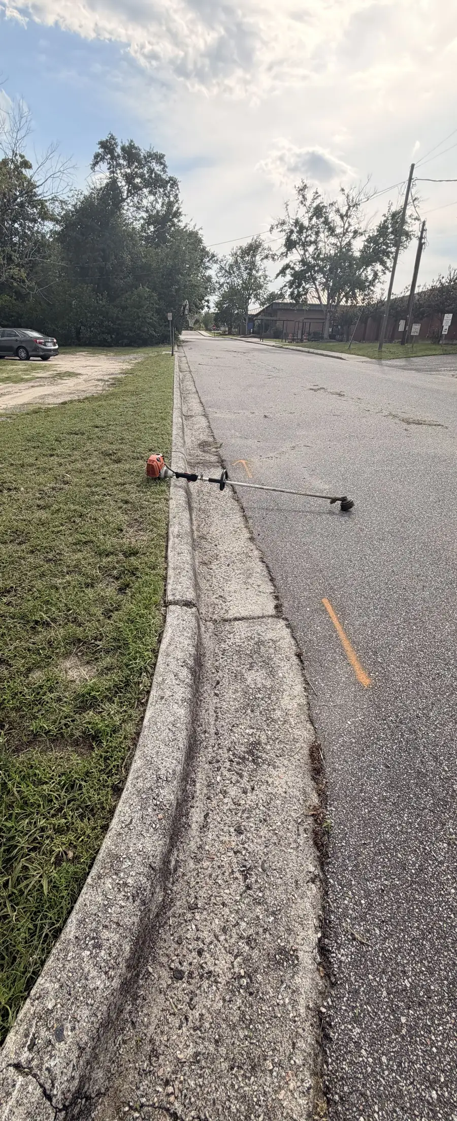 Curb edging after — clean, crisp line